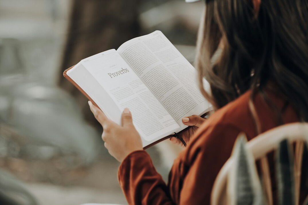 person reading business book