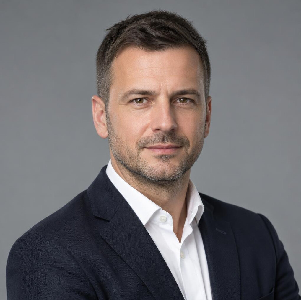 Confident businessman in a shirt portrait on neutral background